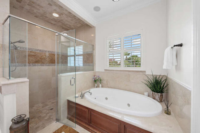 Primary walk-in shower & bath. 23 Corona Rd.