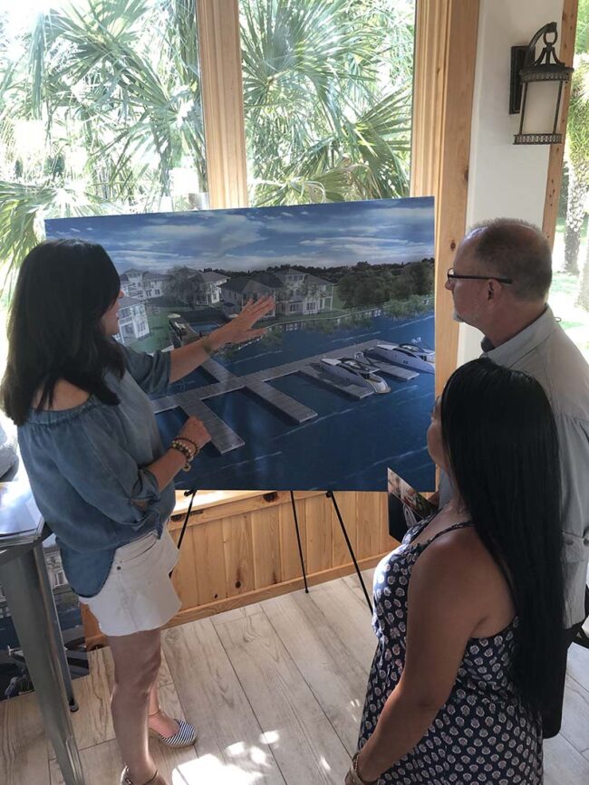 Michelle Mousin-Anderson, PA explains Villa Calissa new construction in St. Augustine to potential clients.