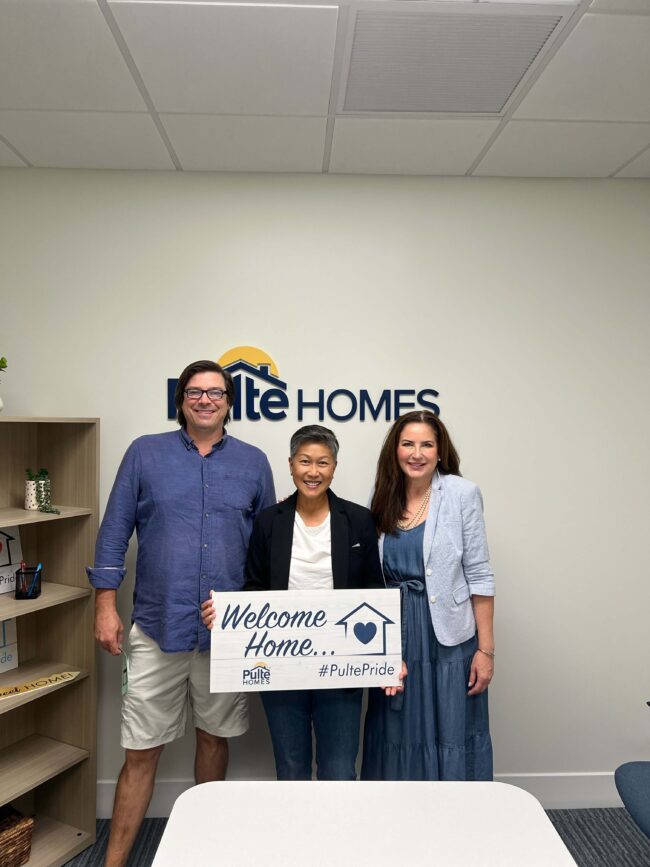 Michelle and Marc with Joanne Santos who purchased a new construction home in St. Augustine